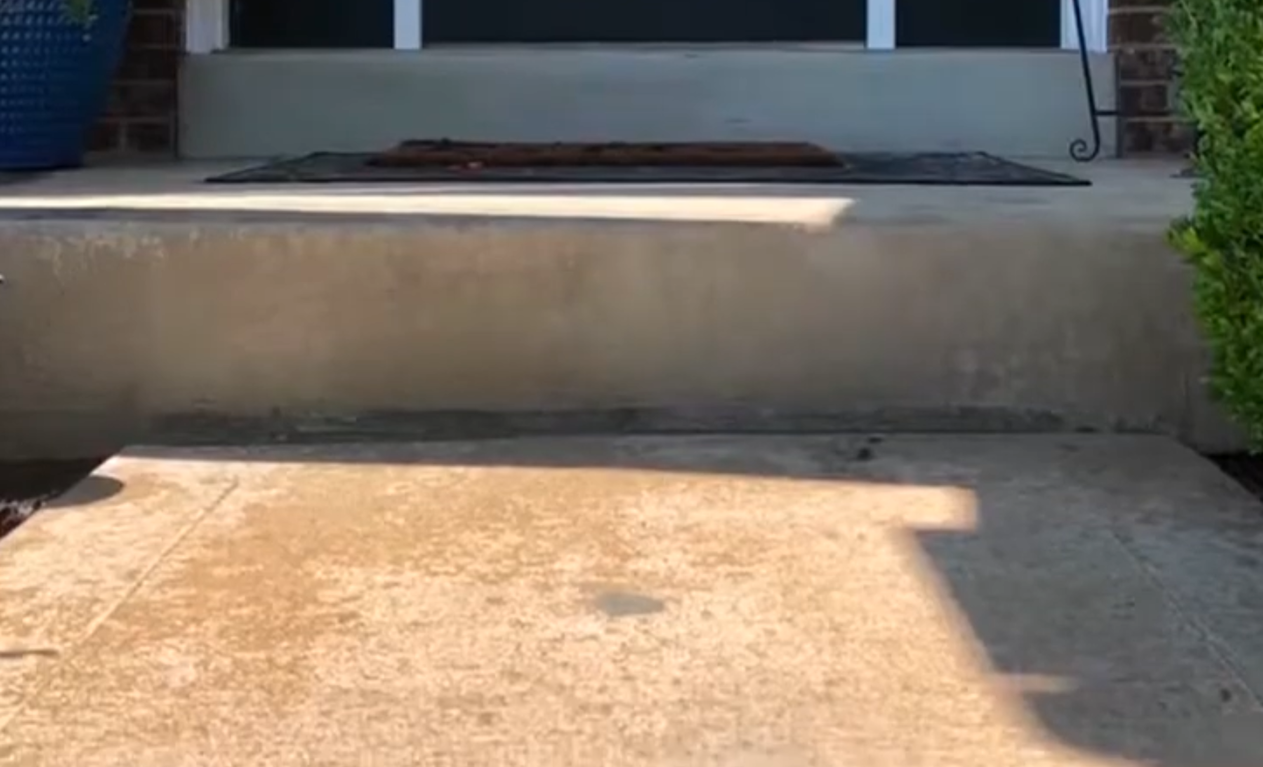 After stoop repair - front stoop raised flush with the entry